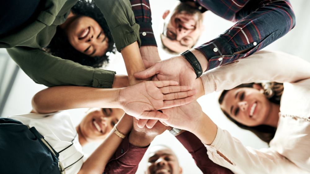 Group of people from diverse backgrounds united in purpose, representing inclusion and advocacy